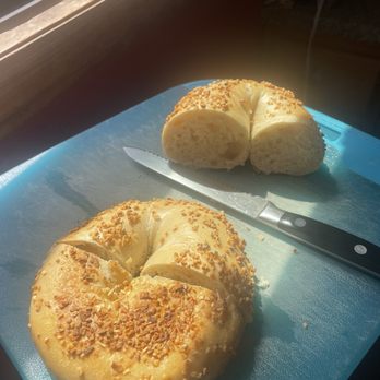 Slims Bagels and Bialys - My onion bagel with butter, yummy - Bakeries Near Me - New York, New York Slims Bagels and Bialys - My onion bagel with butter, yummy - Bakeries Near Me - New York, New York