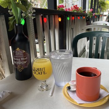 Hobbit Cafe - Mimosa and coffee to kick off Saturday brunch. - Burgers Near Me - Houston, Texas