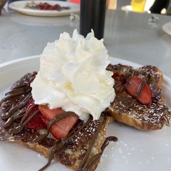 Nutella Cafe - French Toast with Whipped Cream and Strawberries - Desserts Near Me - Chicago, Illinois Nutella Cafe - French Toast with Whipped Cream and Strawberries - Desserts Near Me - Chicago, Illinois