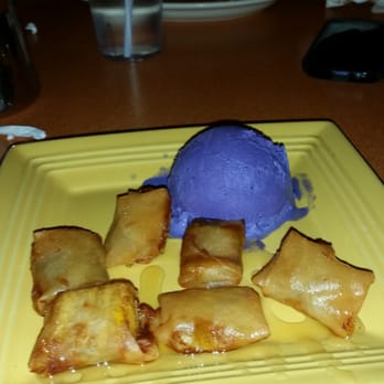 Siam Square - Fried bananas drizzled with honey and a scoop of purple Taro Ice Cream - Thai Near Me - Indianapolis, Indiana Siam Square - Fried bananas drizzled with honey and a scoop of purple Taro Ice Cream - Thai Near Me - Indianapolis, Indiana