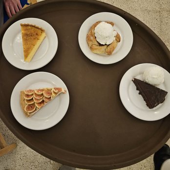 Entremar - Our desserts! Clockwise from the top: apple tart with ice cream, pecan brownie with ice cream,  fig tart, and lemon tart. - Mexican Near Me - México, D.F., DIF