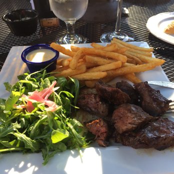 Coco - Steak Frites with some aoli and arugula. The arugula is always salty, which I don't understand. - French Near Me - Buffalo, New York