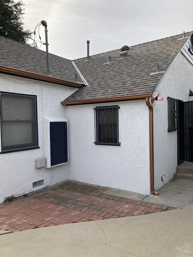 Slide of Pinecrest Roofing