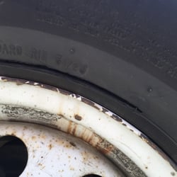 Budget Rent A Car System - We made reservations two weeks in advance for a 16 foot moving truck and a car dolly trailer. This is the tire on the trailer!