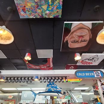 Lowbrow Pizza & Beer - Inside decor, local artist's paintings for sale - Pizza Near Me - Naples, Florida Lowbrow Pizza & Beer - Inside decor, local artist's paintings for sale - Pizza Near Me - Naples, Florida