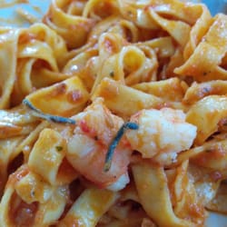 Pizzeria Carlo - Tagliatelle Scampi ala Carlo... man beachte den Darm.. aber auch abgesehen davon ungenießbar