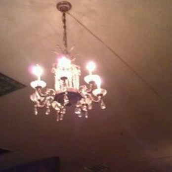 Sundown Saloon - a chandelier hanging from the ceiling - Dive Bars Near Me - Houston, Texas Sundown Saloon - a chandelier hanging from the ceiling - Dive Bars Near Me - Houston, Texas