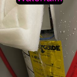 McLaughlin Appliance Sales Service & Parts - Shows water cascading out of tank.