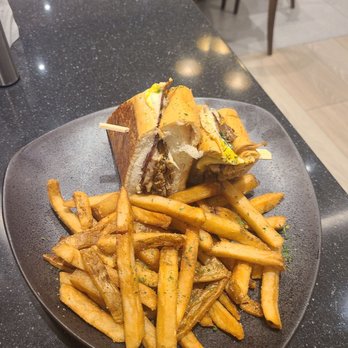 Flor de Caña Eatery & Bar - Cuban sandwich, comes with fries. Mostly fries but the sandwich itself is dense and packed. It's quite filling honestly. - Breakfast & Brunch Near Me - Caguas, Puerto Rico