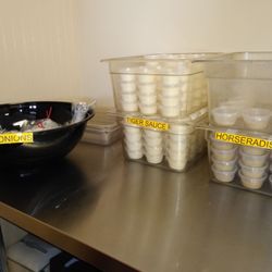The Pit Sandwich Spot - Counter with self serve condiments.
