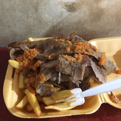 Doner kebab over chips.