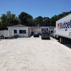 Budget Truck Rental - Store location is tuck away off the road behind their inventory of trucks. Parking area is tight.