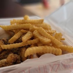 A Town Wings - 1/2 Lemon Pepper and 1/2 Garlic Parmesan 10 piece with fries