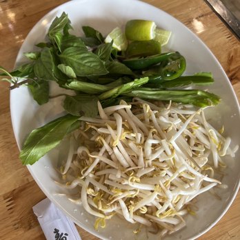 Photastic - Bean sprouts, lime, jalapeños and mint to add to your pho - Vietnamese Near Me - Miami, Florida
