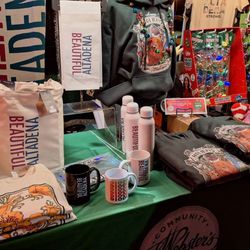 Christmas Tree Lane - Webster's Community Pharmacy booth at 2025 tree lighting ceremony