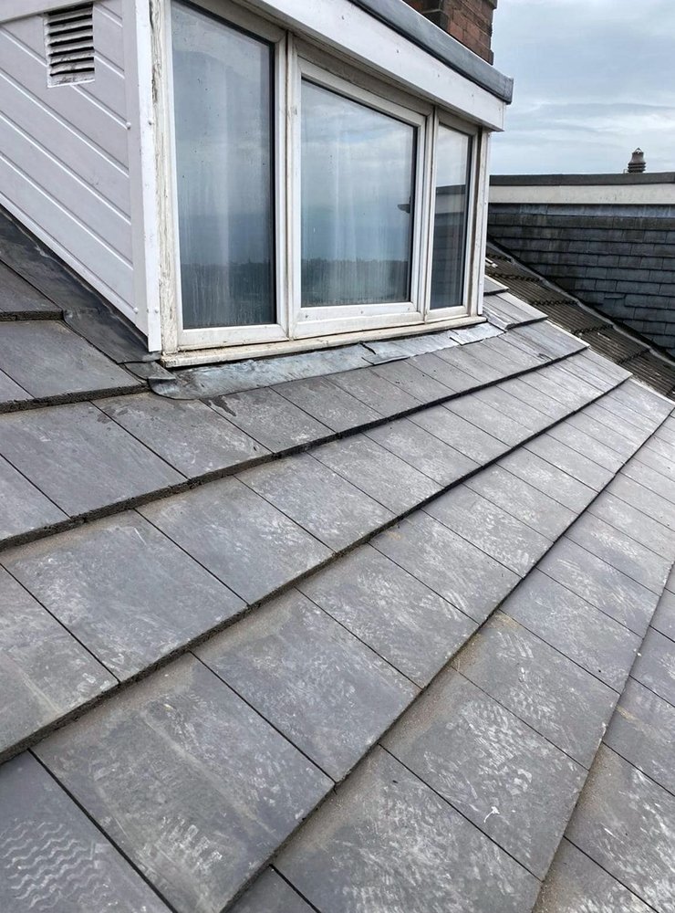 Slide of Santa Anita Roofing