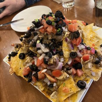 The Trapper Grill / Deadman's Bar - Nachos for two!! Could have easily fed 6 people. Loaded with protein and cheese! - Coffee & Tea Near Me - Moran, Wyoming The Trapper Grill / Deadman's Bar - Nachos for two!! Could have easily fed 6 people. Loaded with protein and cheese! - Coffee & Tea Near Me - Moran, Wyoming