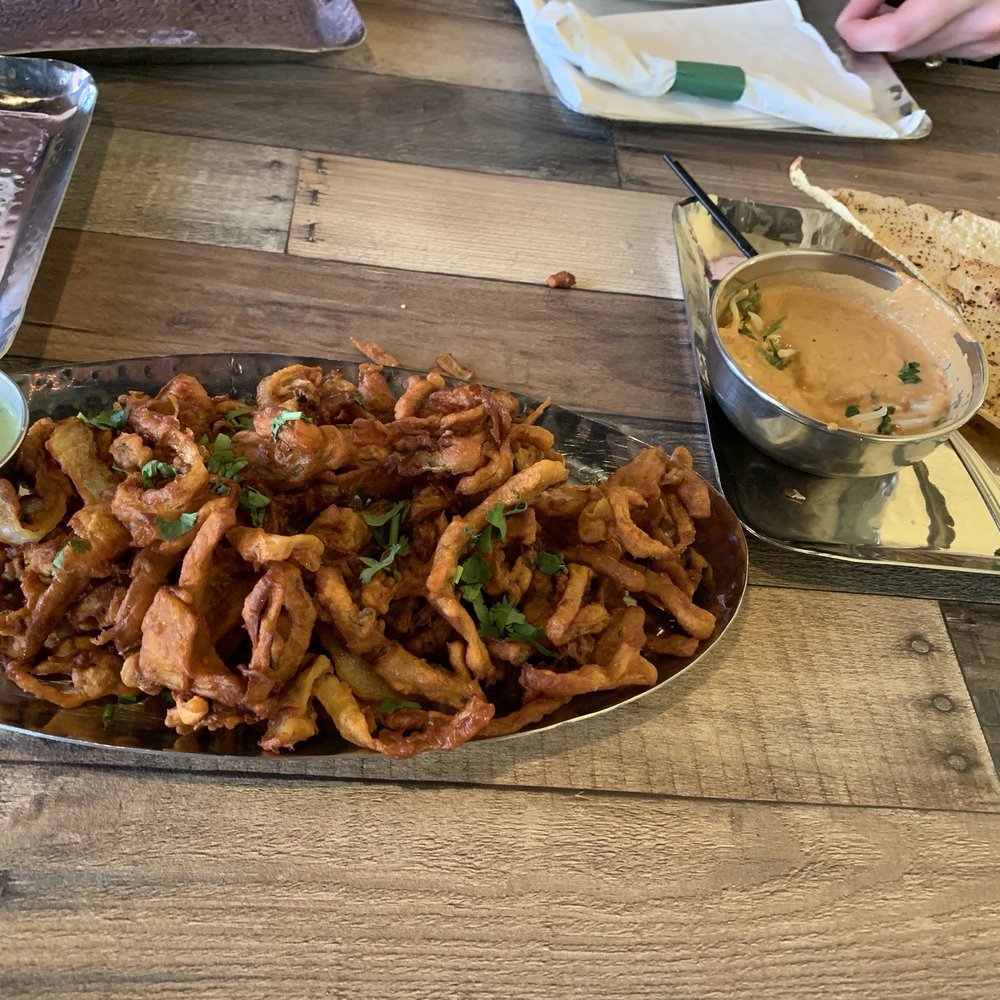 Onion Pakoda appetizer and tikki queso Onion Pakoda appetizer and tikki queso