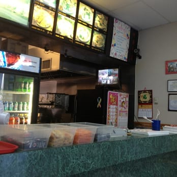New China - the counter and menus of a restaurant - Chinese Near Me - Clearwater, Florida New China - the counter and menus of a restaurant - Chinese Near Me - Clearwater, Florida