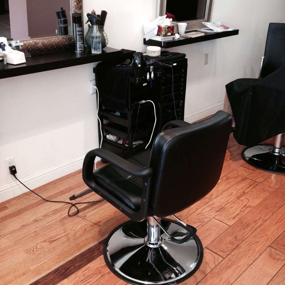Nancy Hair - Rever Salon Logo
