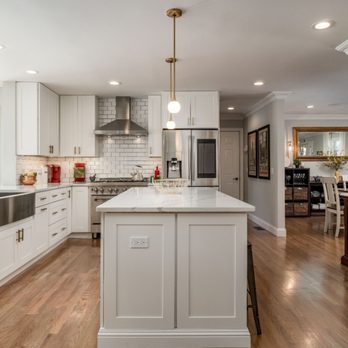 VMJ Espinoza Contracting - a kitchen with a center island - Painters Near Me VMJ Espinoza Contracting - a kitchen with a center island - Painters Near Me