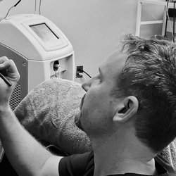 Nuderma Health & Med Spa - Dr. Spencer preparing for Liposuction