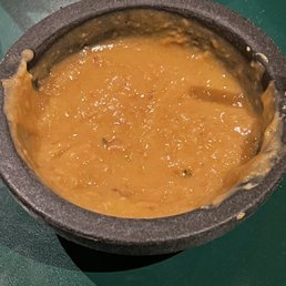 Bean dip brought to the table for chips and dip. Bean dip brought to the table for chips and dip.