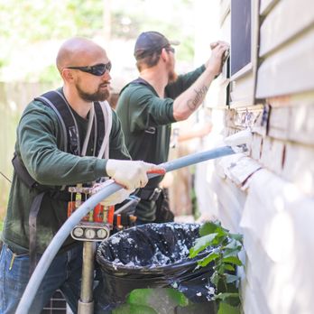 RetroGreen Energy - RetroFoam insulation being injected into an exterior wall - Home Organization Near Me - Saint Cloud, Minnesota