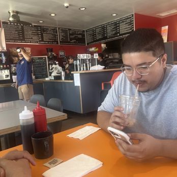 Rooster Cafe - Inside order at corner they bring food out yummy latte - Breakfast & Brunch Near Me - Costa Mesa, California Rooster Cafe - Inside order at corner they bring food out yummy latte - Breakfast & Brunch Near Me - Costa Mesa, California