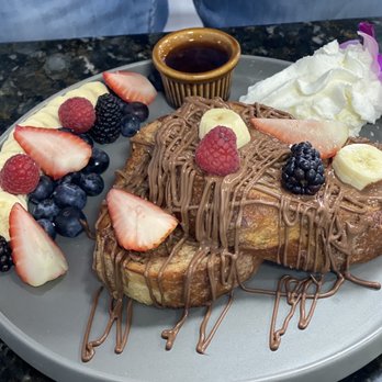 Tata's Cafe - French toast with Nutella drizzle. - Breakfast & Brunch Near Me - Hawthorne, California Tata's Cafe - French toast with Nutella drizzle. - Breakfast & Brunch Near Me - Hawthorne, California