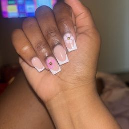 my nail set i received. nails were big and bulky due to use of large tips. also the gem faded after a few days. paid 130 my nail set i received. nails were big and bulky due to use of large tips. also the gem faded after a few days. paid 130