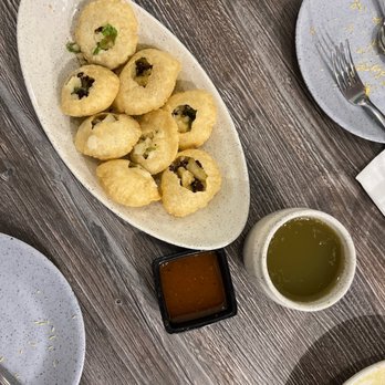 Gwalia Sweets & Restaurant - a plate of cookies and a cup of tea - Indian Near Me - Toronto, Ontario Gwalia Sweets & Restaurant - a plate of cookies and a cup of tea - Indian Near Me - Toronto, Ontario