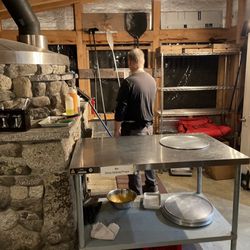 Strong's Public House & Patio - Stones from excavation the patio built the oven.