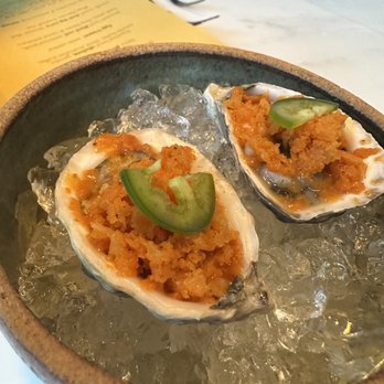 1601 Bar & Kitchen - Tasty oysters with tomato chutney on top of it. Compliments each other so well - Asian Fusion Near Me - San Francisco, California 1601 Bar & Kitchen - Tasty oysters with tomato chutney on top of it. Compliments each other so well - Asian Fusion Near Me - San Francisco, California
