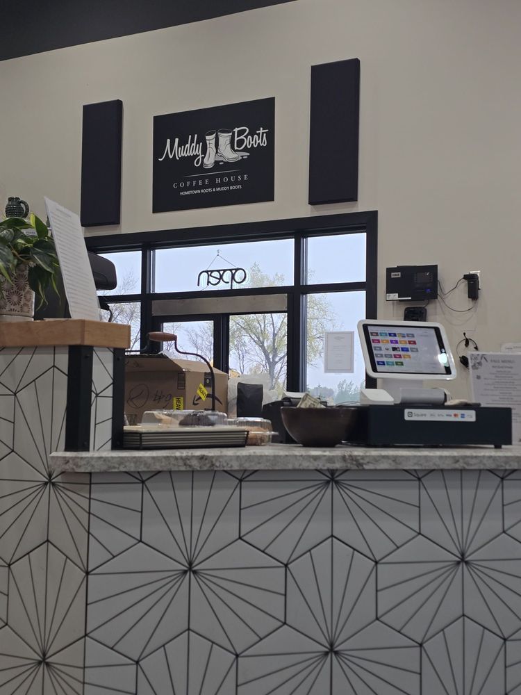 Muddy Boots Coffee House Logo