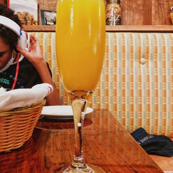 Bellini - Bellini -- Fresh peach pu​rée, topped with Italian prosecco - Italian Near Me - Philadelphia, Pennsylvania