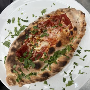 Trattoria - Vegan calzone - Italian Near Me - Windermere, CMA Trattoria - Vegan calzone - Italian Near Me - Windermere, CMA