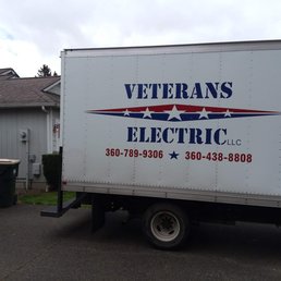 Veterans Electric LLC work truck parked in our driveway.