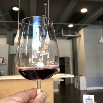 Brooklyn West Winery - Cheers of a beautiful glass of red wine at Brooklyn West Winery in Oakland. - Wine Tasting Room Near Me - Oakland, California
