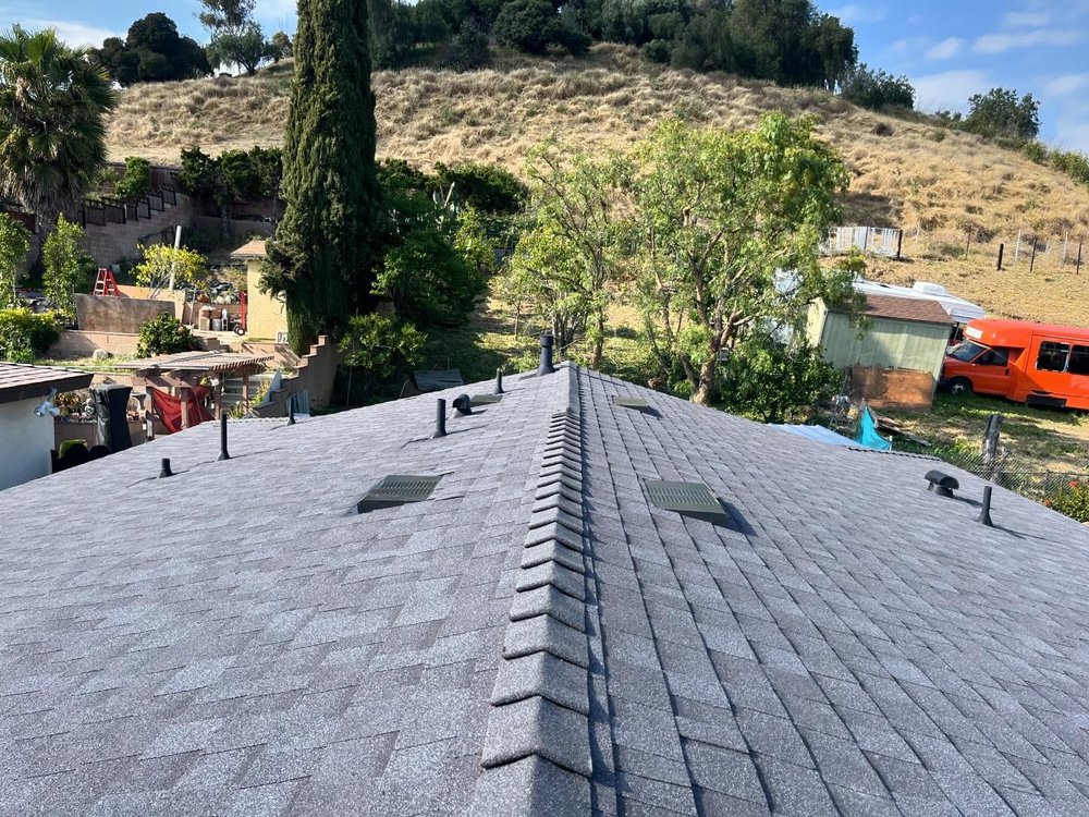 Slide of Straw Hat Roofers