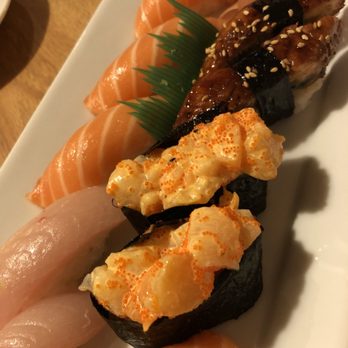 Teppay - From left to right: salmon, yellow tail, unagi, spicy chopped scallop nigiri - Sushi Bars Near Me - Houston, Texas Teppay - From left to right: salmon, yellow tail, unagi, spicy chopped scallop nigiri - Sushi Bars Near Me - Houston, Texas
