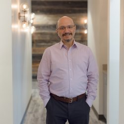 Dr. Manish Mistry in the hallway at Brightside Family Dental