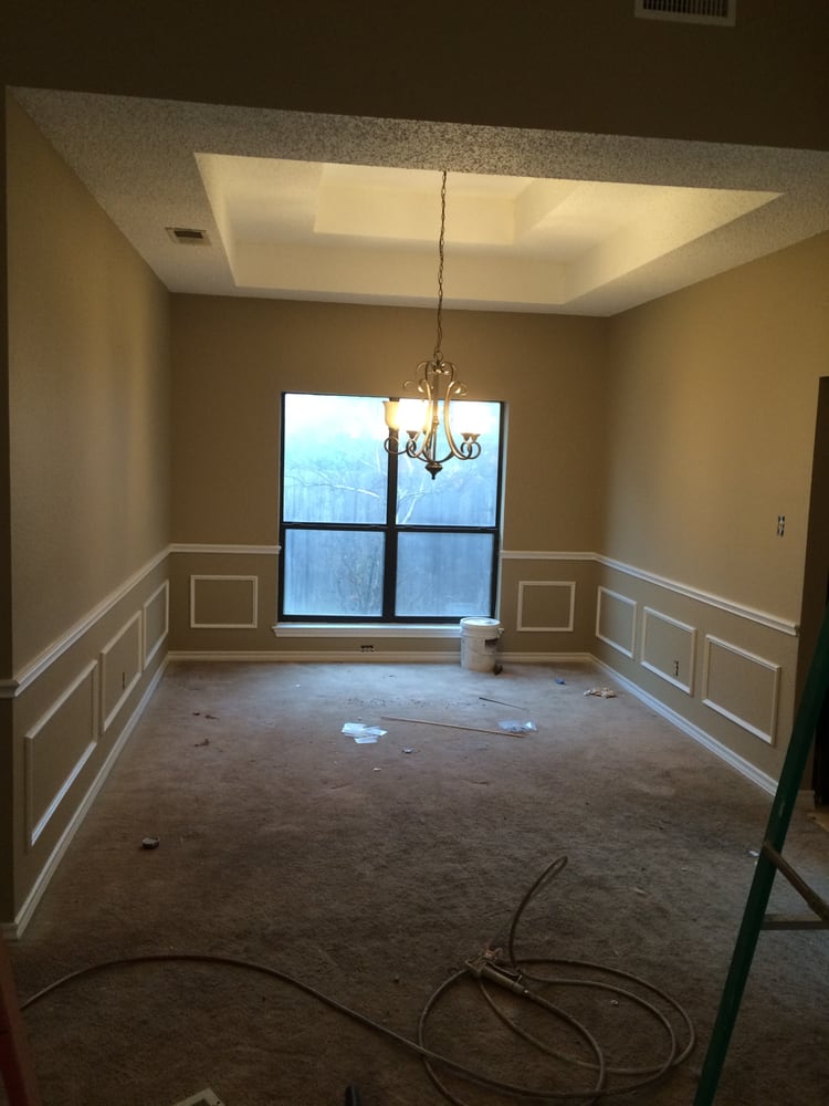 Slide of Tomahawk Roofing Company