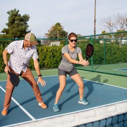 Golden Village Palms RV Resort - Pickleball instruction on one of our 10 professional pickleball courts.