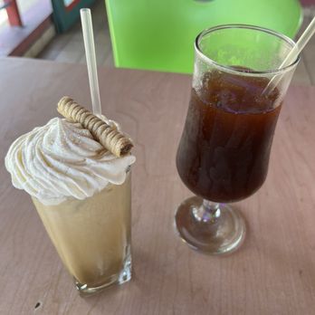 Suculento - Iced coffees (regular on left, black on right) - Caribbean Near Me - Aguada Pueblo, Puerto Rico Suculento - Iced coffees (regular on left, black on right) - Caribbean Near Me - Aguada Pueblo, Puerto Rico