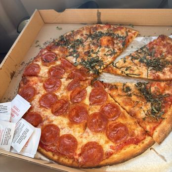 Zpizza - This is exactly how it looked from the counter. Slices all spread out. I just wasn't convinced that it was fresh. - Pizza Near Me - Huntington Beach, California