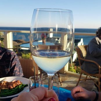 Geoffrey's Malibu - Glass of wine with a beautiful view. - Seafood Near Me - Malibu, California