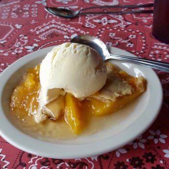 Rendezvous Diner - A half order of peach cobbler a la mode. Delicious! - American Near Me - Greer, Arizona