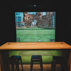 Clubhouse 24/7 Golf Simulator - One of the bays at Bedford