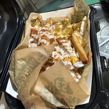 Wingstop - a tray of food on a table - Chicken Wings Near Me - Hawthorne, California Wingstop - a tray of food on a table - Chicken Wings Near Me - Hawthorne, California